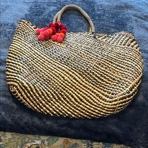 INC International Concepts Black and Tan Woven Tote with Red Pom Poms